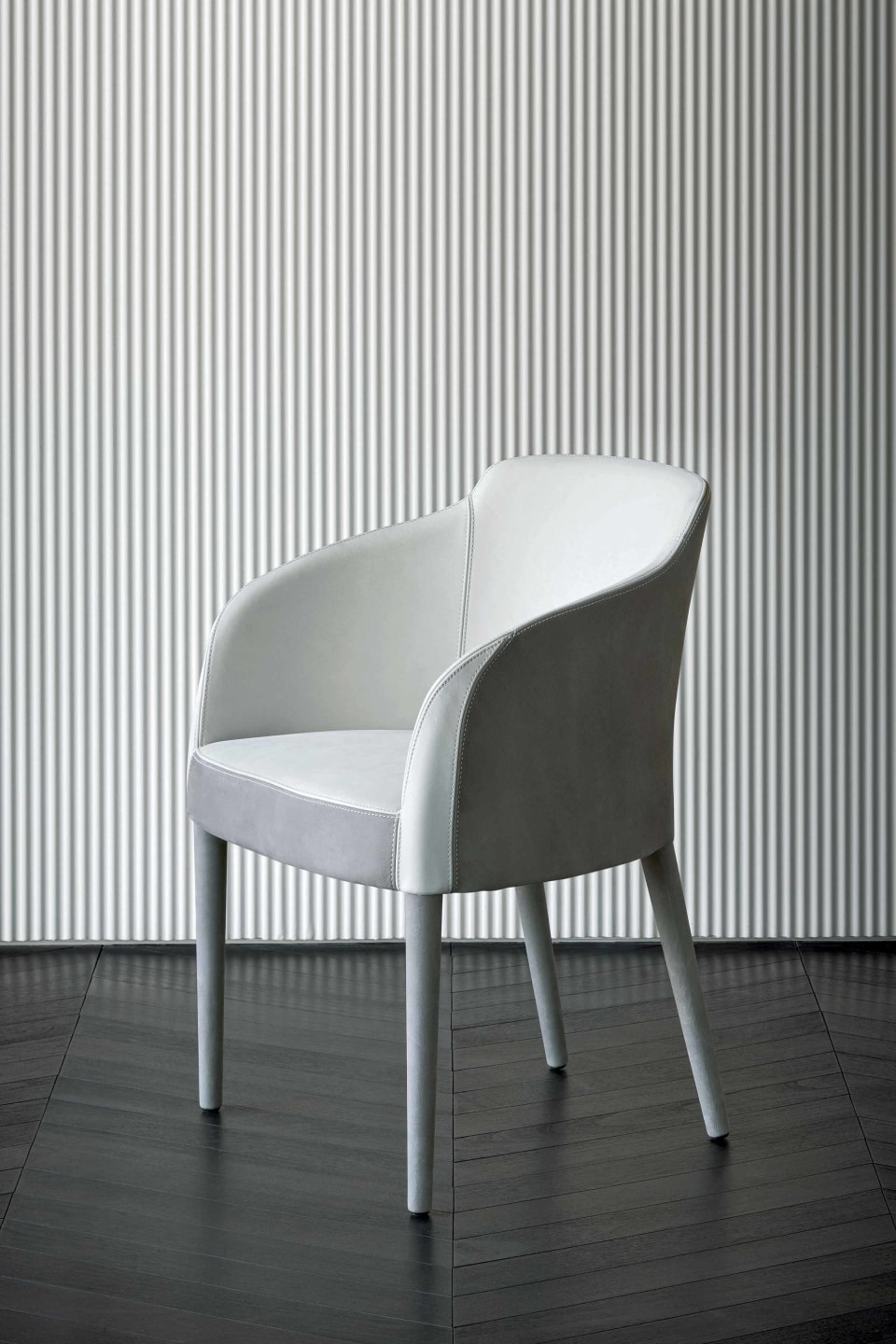Egg armchair | Rugiano. Elegant armchair with refined lines and luxurious upholstery, perfect for modern interiors.