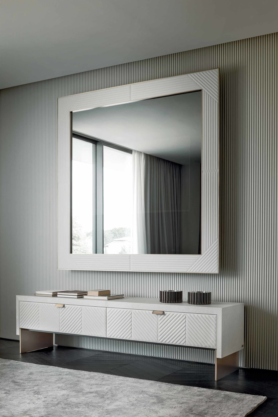 Ghost tv furniture | Rugiano. Upholstered TV cabinet with integrated media mirror and elegant metal detailing.