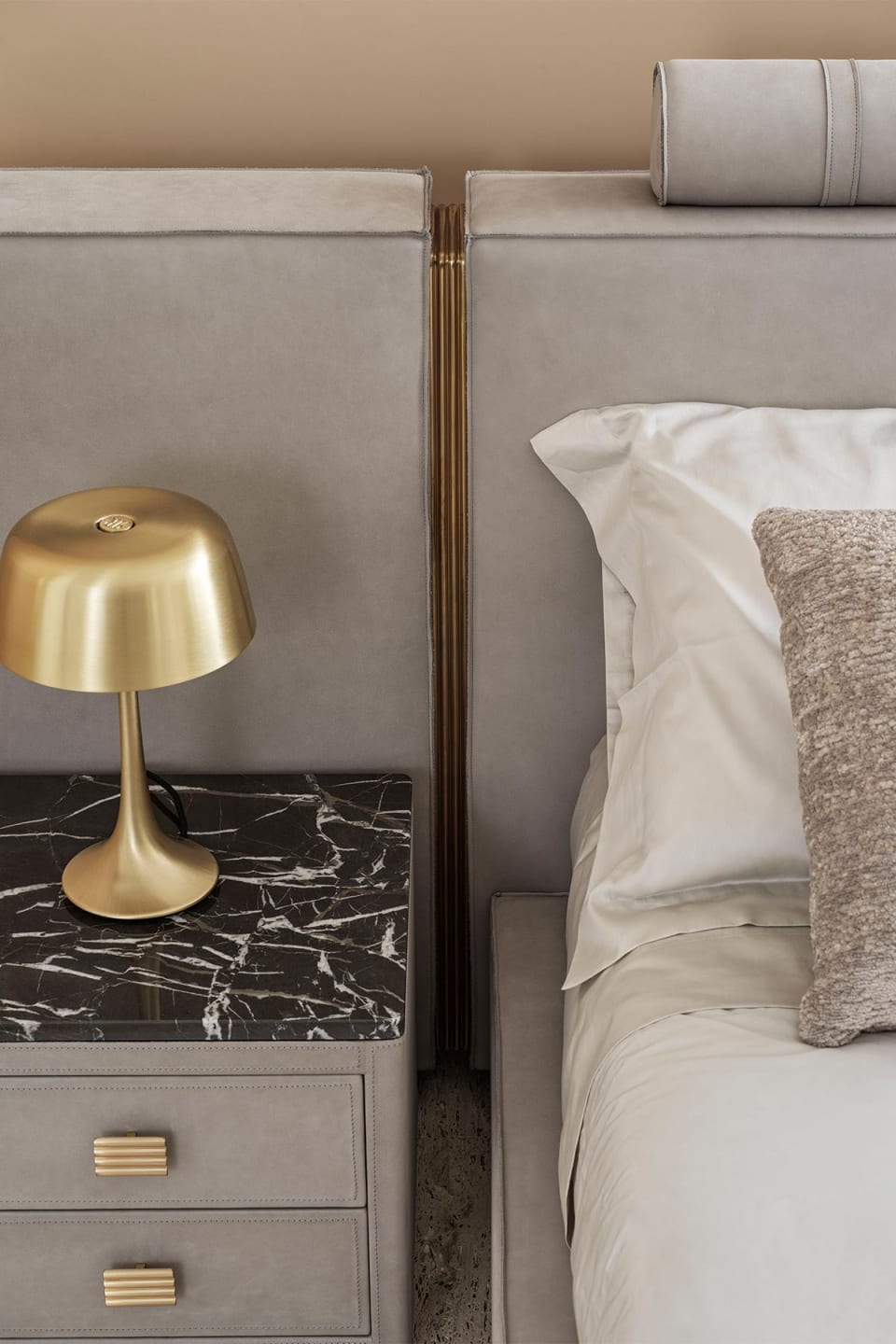 Rubik Big bed | Rugiano. Luxurious upholstered bed with striking metal accents and a bold headboard design.