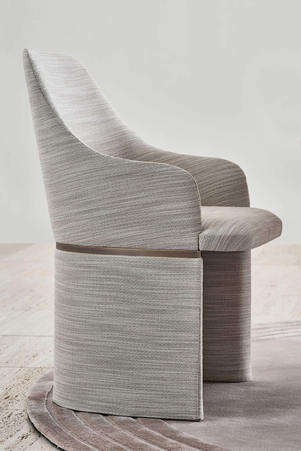 Giorgia chair | Rugiano. A contemporary dining chair featuring a unique single-shell design, upholstered in premium leather or fabric with elegant metal accents.