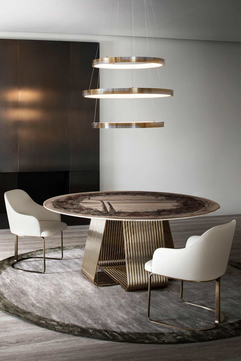 Marie chair | Rugiano. Upholstered chair with a sleek silhouette and elegant bronze base, perfect for modern interiors.