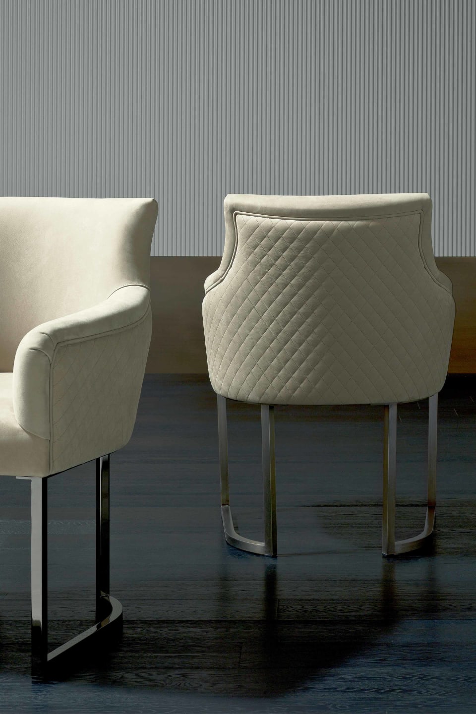 Itaca armchair | Rugiano. Luxuriously upholstered chair with elegant metal legs, offering refined comfort and bespoke finishes for any sophisticated interior.