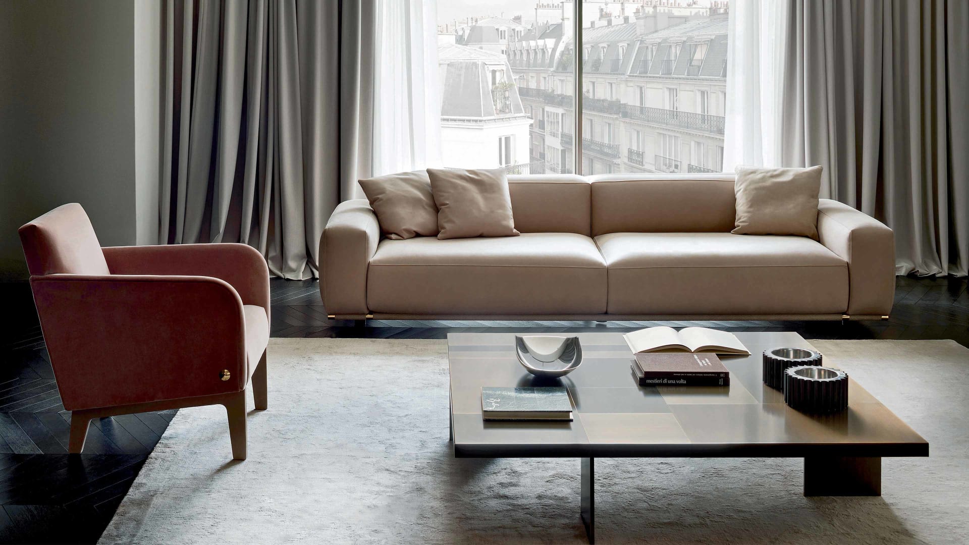 Agata armchair | Rugiano. Elegant armchair with upholstered legs and refined bronze details, offering luxurious comfort and sophisticated style.