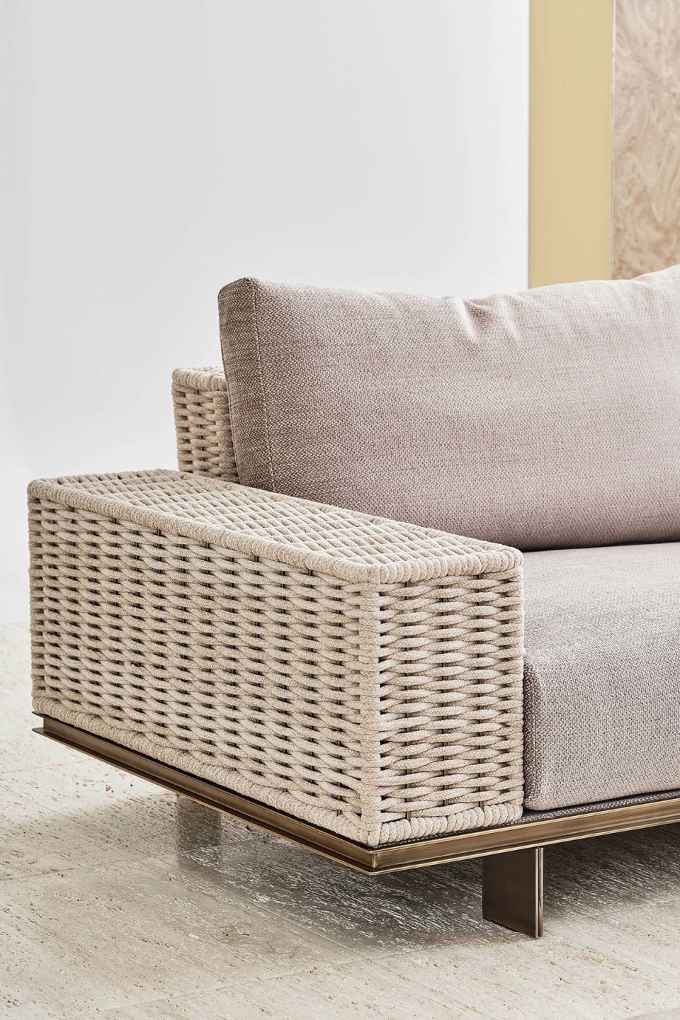Memphis Intreccio sofa | Rugiano. Luxurious sofa with linear metal base, elegant leather details, and integrated marble coffee tables for versatile compositions.