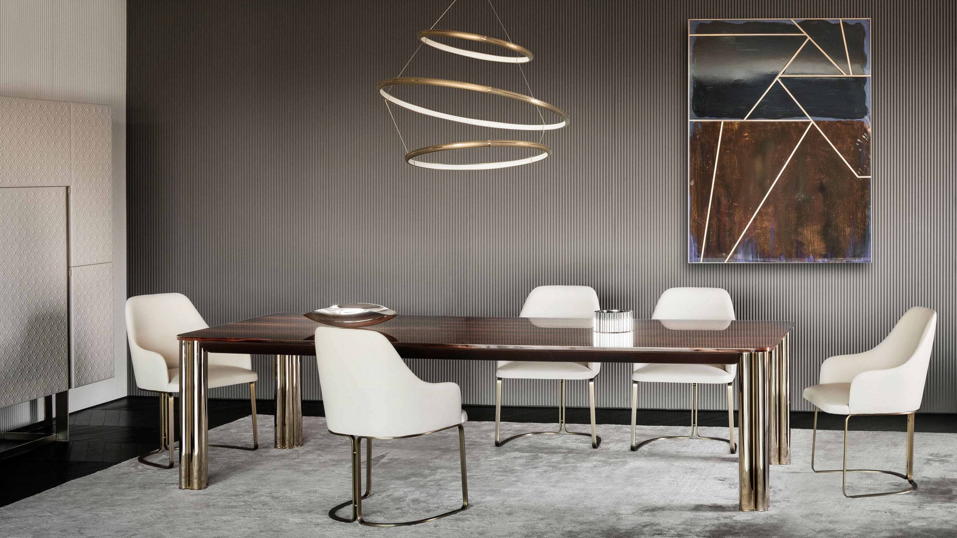 Marie chair | Rugiano. Upholstered chair with a sleek silhouette and elegant bronze base, perfect for modern interiors.