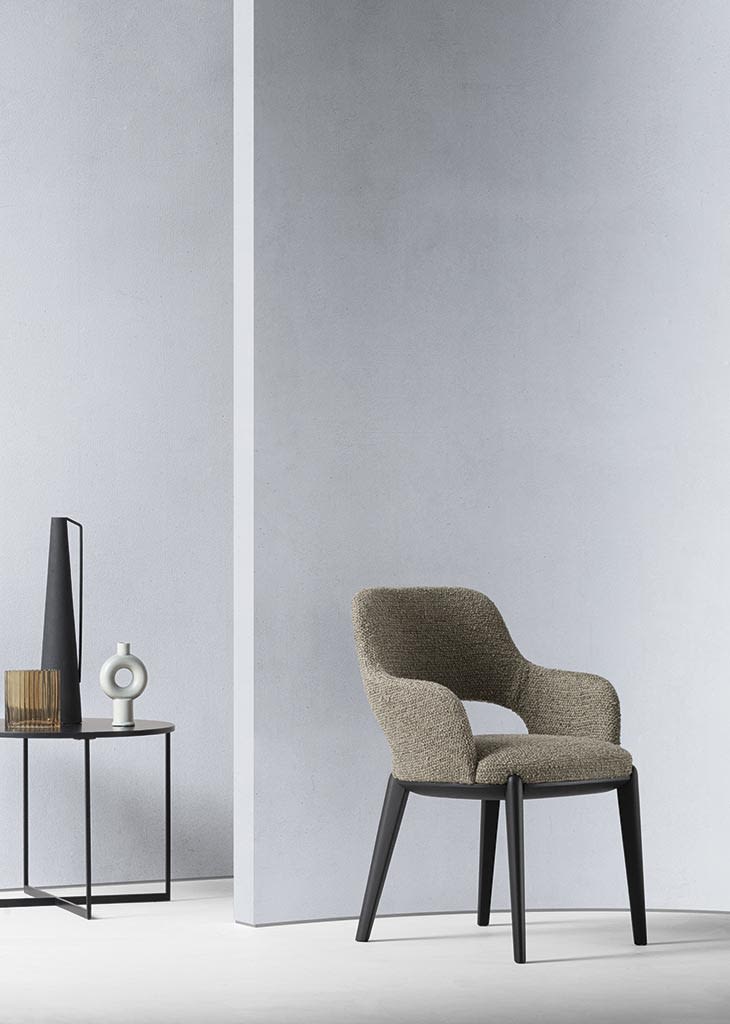 Tina chair | ALF Dafre. Elegant chair with a metal frame and soft upholstery, perfect for modern interiors.