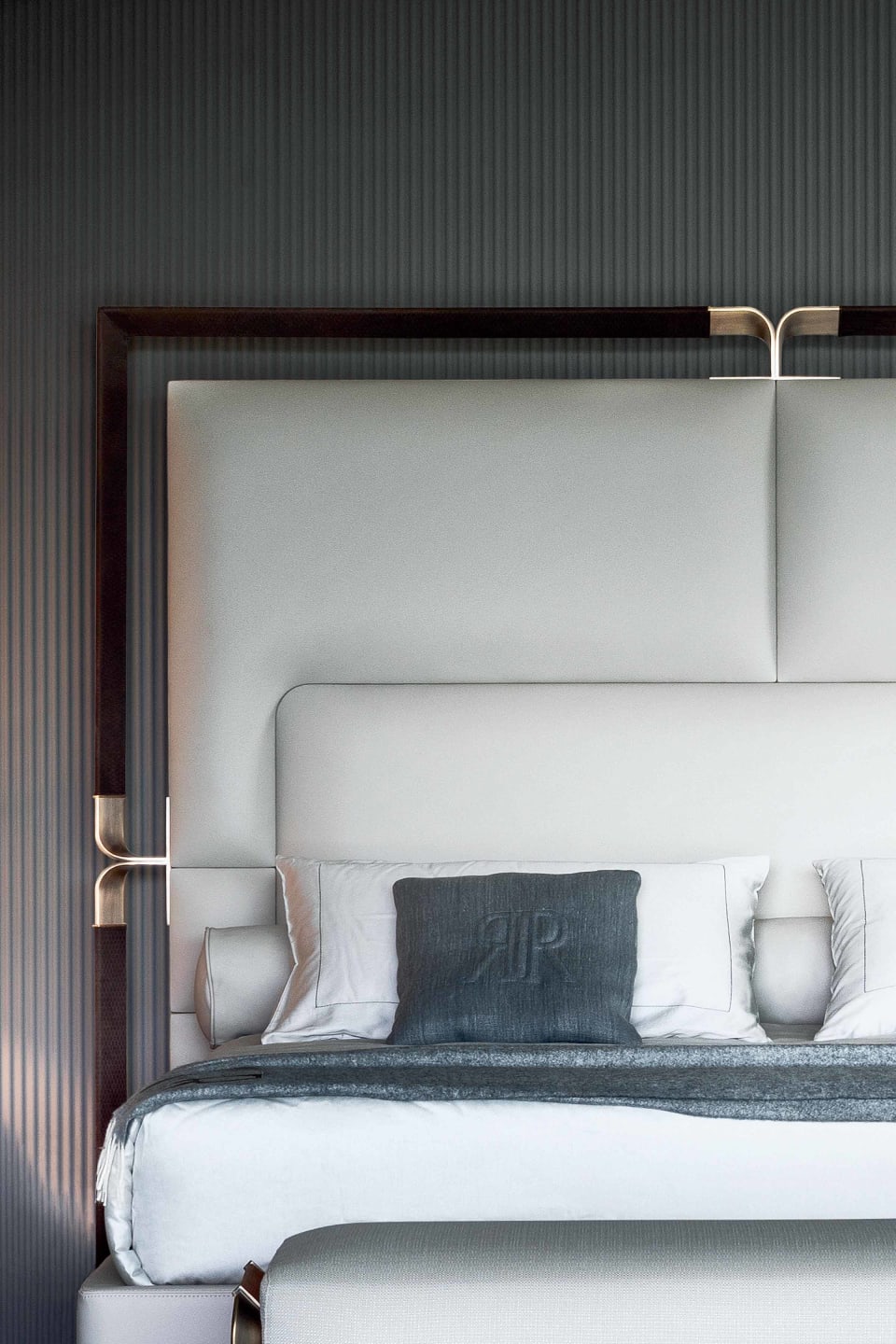 Grace bed | Rugiano. Luxurious upholstered bed with elegant metal details, offering supreme comfort and sophisticated design.