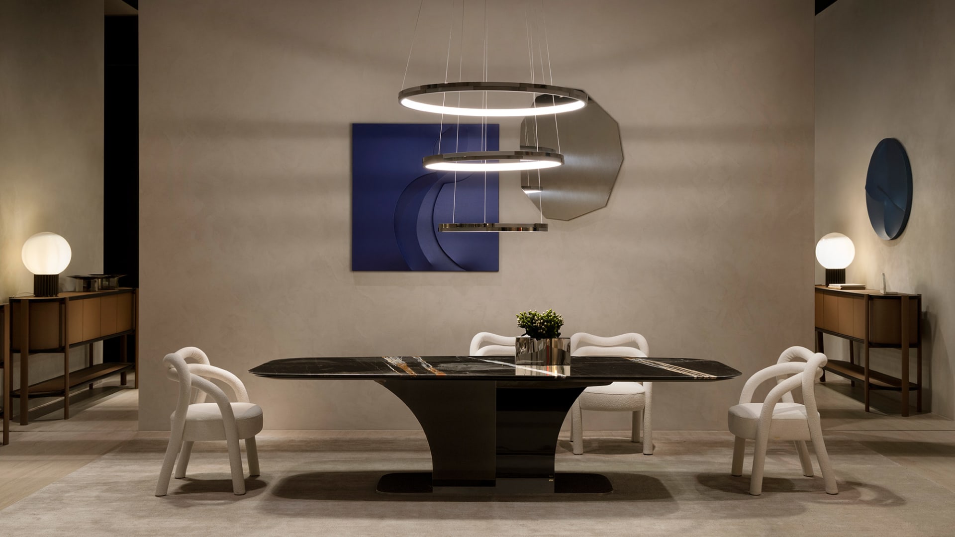 Spectro table | Rugiano. Exquisite dining table with a monumental marble top and elegant curved base, embodying modern luxury.