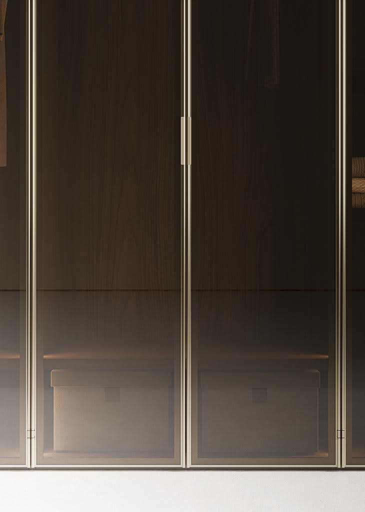 Pure closet | ALF Dafre. Elegant hinged door with clean lines for modern wardrobes and closets, ensuring seamless integration and functionality.