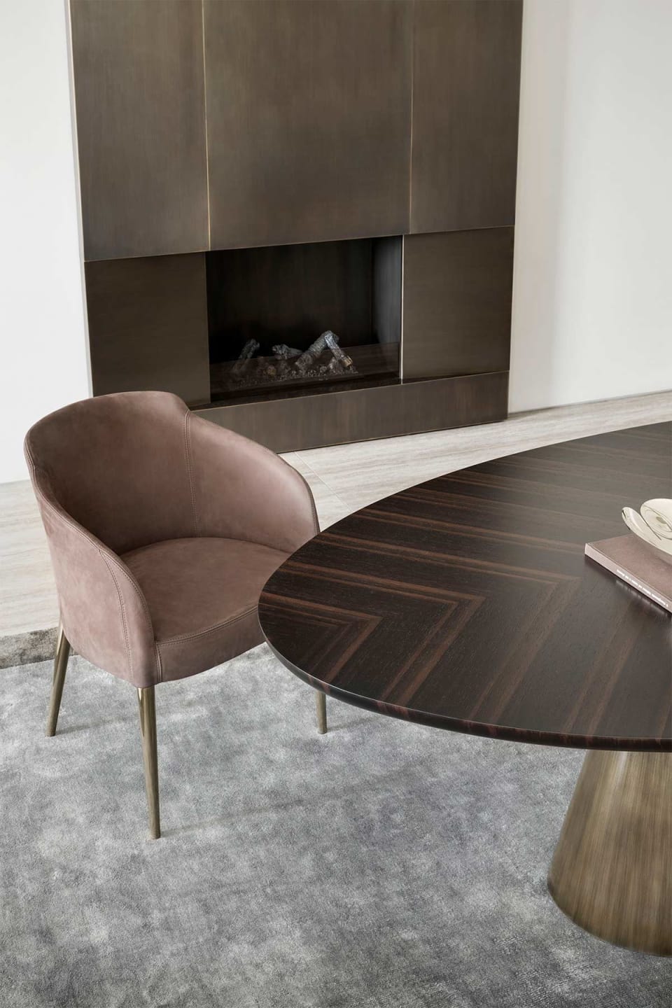 Egg armchair | Rugiano. Elegant armchair with refined lines and luxurious upholstery, perfect for modern interiors.