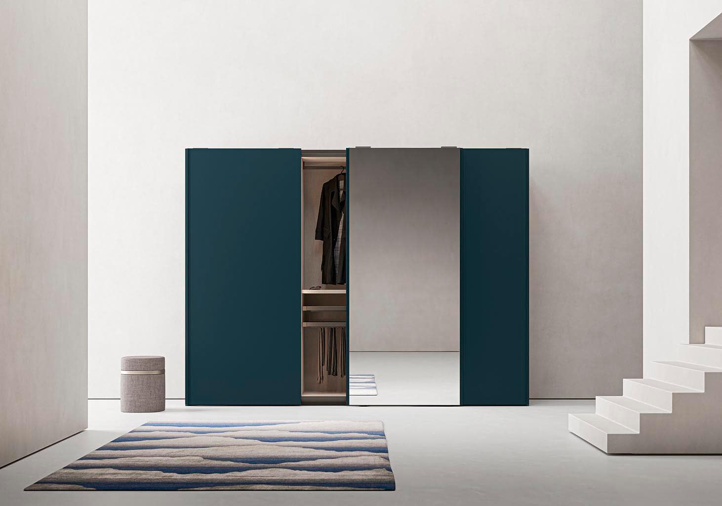 Go Up Sliding Door wardrobe | ALF Dafre. Modern wardrobe with sliding doors and an elegant metal groove profile serving as an integrated handle.