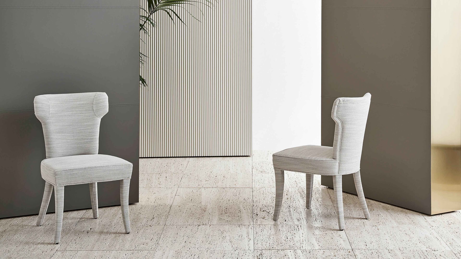 Guenda chair | Rugiano. Elegant armchair with customizable upholstered or wooden legs, perfect for refined interiors.