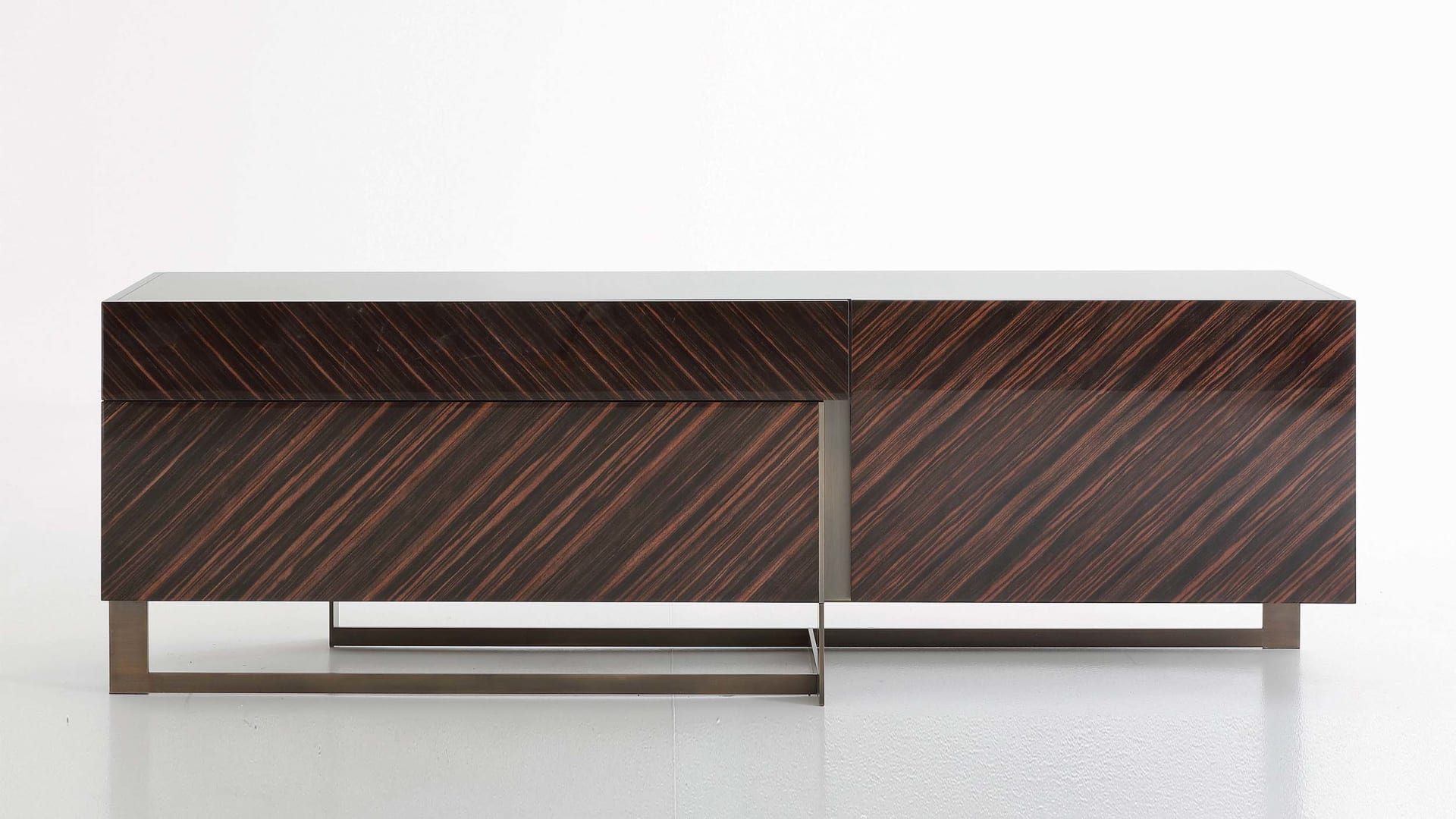 Blade tv furniture | Rugiano. Luxury TV cabinet Blade with sleek design, available in ebony or leather, featuring metal base and ample storage.