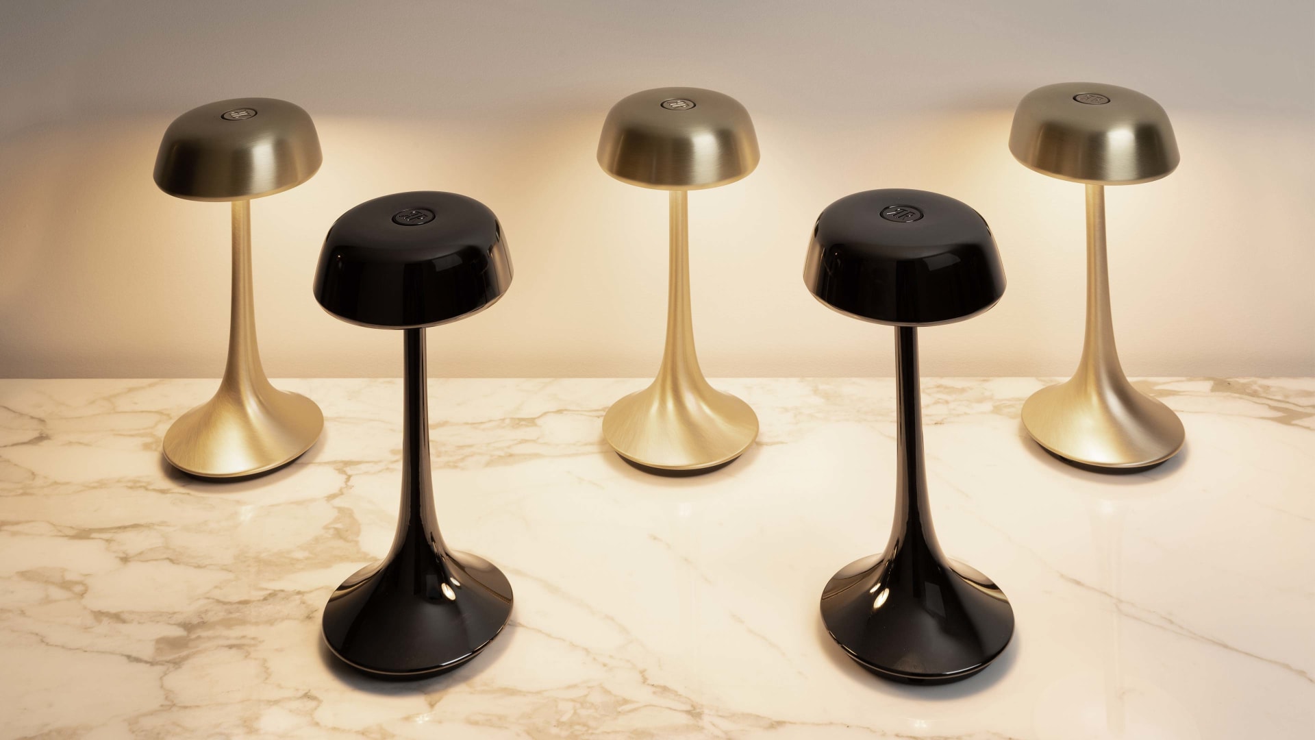 Wanda floor lamp | Rugiano. Exquisite lamp collection with a portable touch-controlled model and a floor lamp featuring a marble side table.