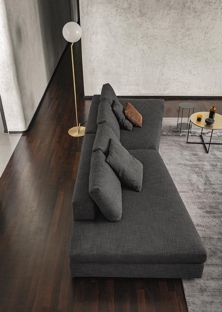 California sofa | ALF Dafre. Modular sofa with integrated wooden bookcases, creating flexible and inviting spaces.