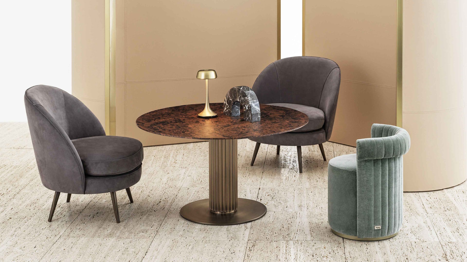 Liberty Lounge Bistrot table | Rugiano. An elegant bistrot table featuring a distinctive column-like bronze aluminum base and a luxurious marble or hand-painted top.