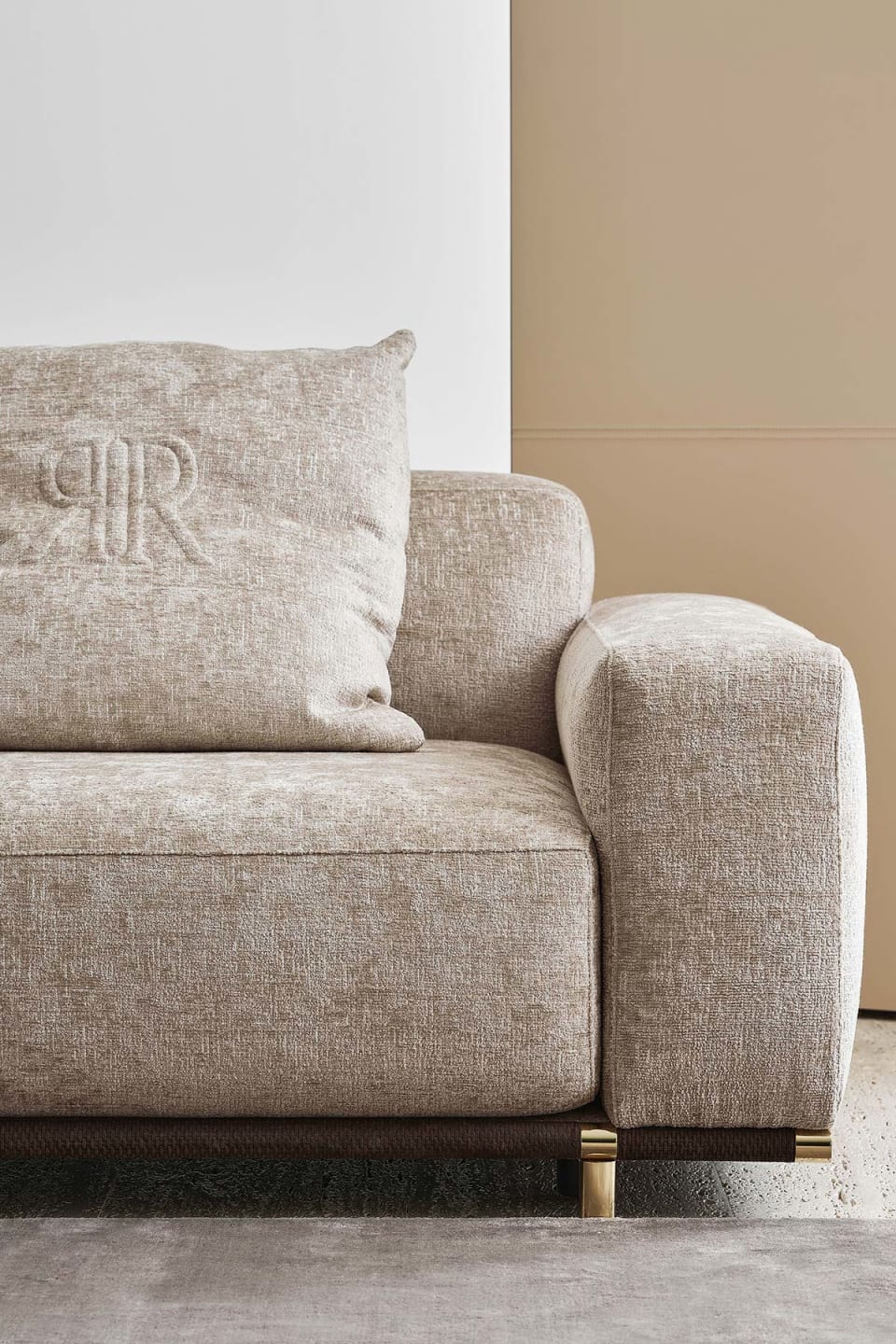Boheme sofa | Rugiano. Luxurious leather sofa with metal base and elegant gold or bronze accents.