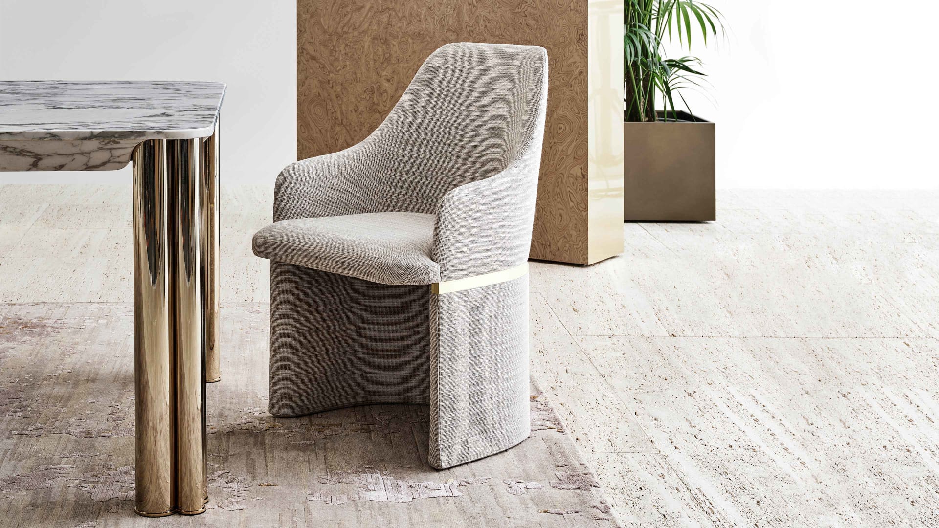 Giorgia chair | Rugiano. A contemporary dining chair featuring a unique single-shell design, upholstered in premium leather or fabric with elegant metal accents.