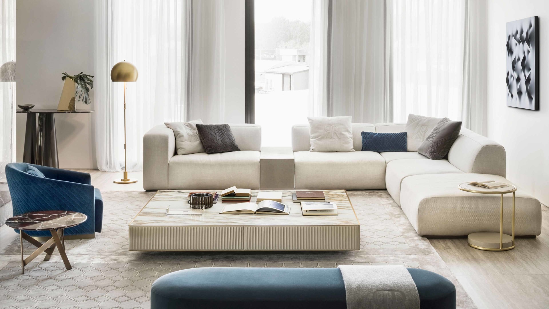 Freud armchair | Rugiano. Modular sofa and armchair range with distinctive baguette stitching and integrated side tables, offering ultimate comfort and design flexibility.