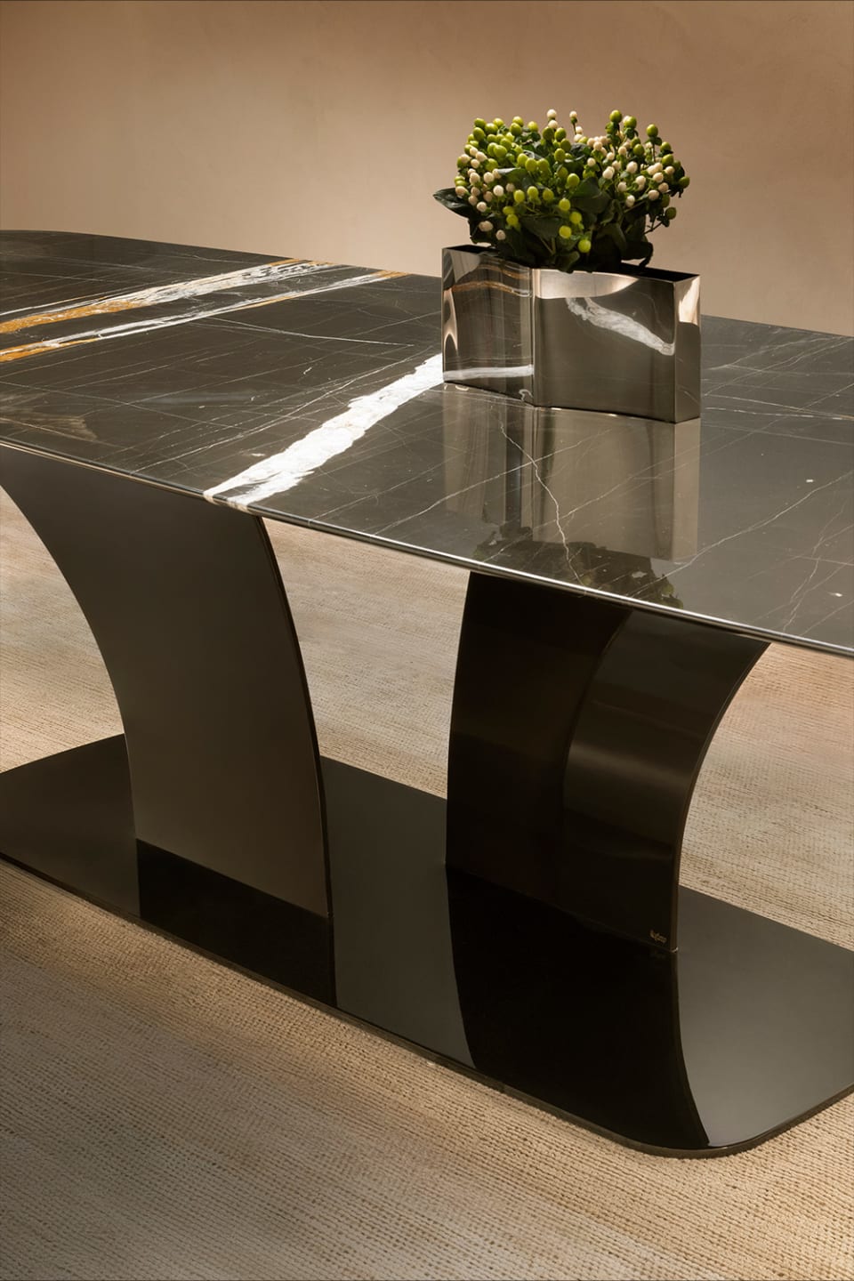 Spectro table | Rugiano. Exquisite dining table with a monumental marble top and elegant curved base, embodying modern luxury.