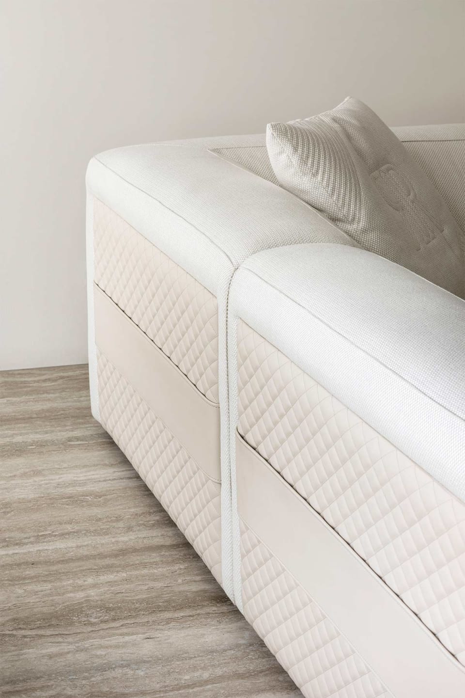Freud armchair | Rugiano. Modular sofa and armchair range with distinctive baguette stitching and integrated side tables, offering ultimate comfort and design flexibility.