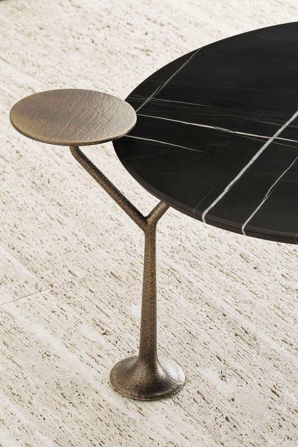 Bonsai coffee table | Rugiano. A collection of elegant coffee tables featuring a unique brass base and multi-level tops inspired by the delicate silhouette of a bonsai tree.