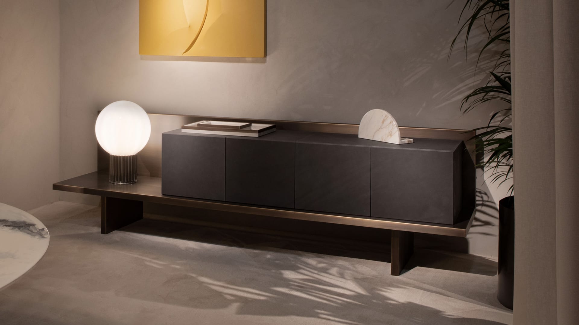 Trace sideboard | Rugiano. Exquisite sideboard with a marble facade and metal base, blending the luxury of natural stone with modern design.
