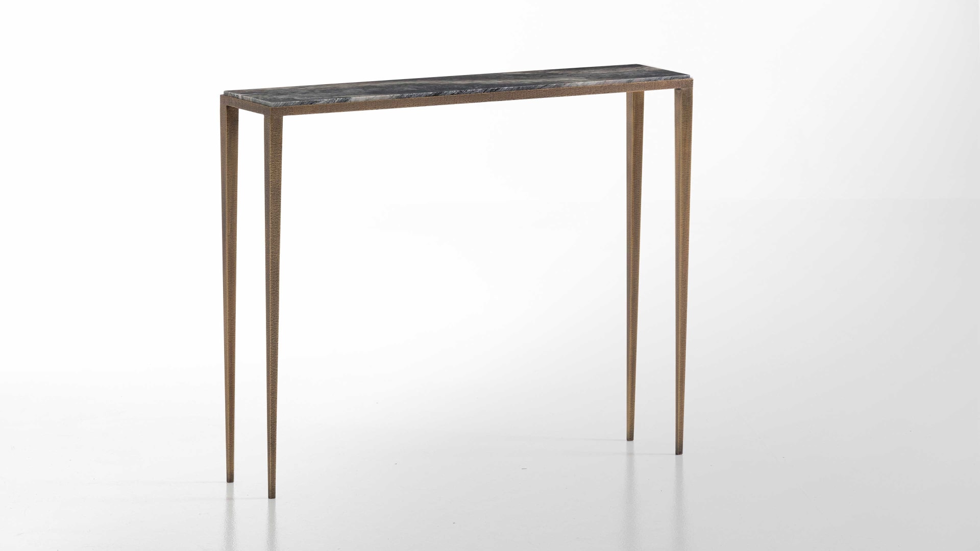 Dorotea console | Rugiano. Minimalist console with hammered bronze and marble tops, available in two sizes.