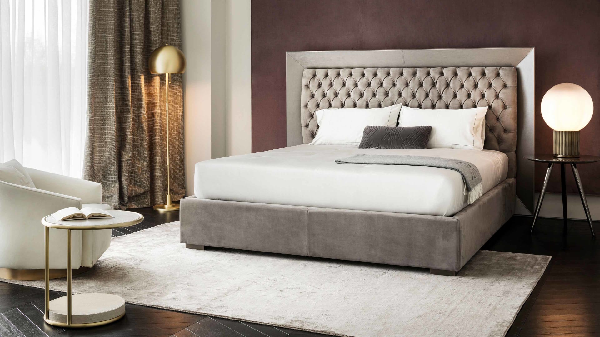 Kenya bed | Rugiano. An elegant bed featuring a distinctive tufted headboard, available with an upholstered or Makassar Ebony frame.